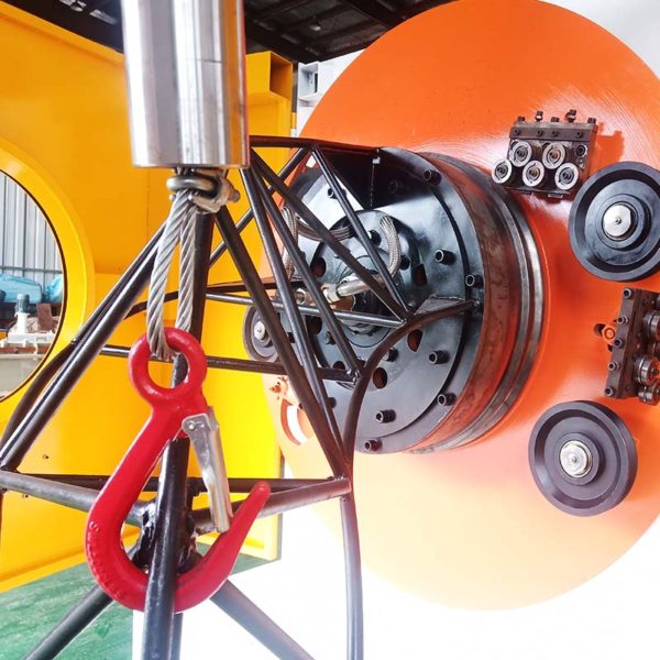 Elephant trunk wire coil machine